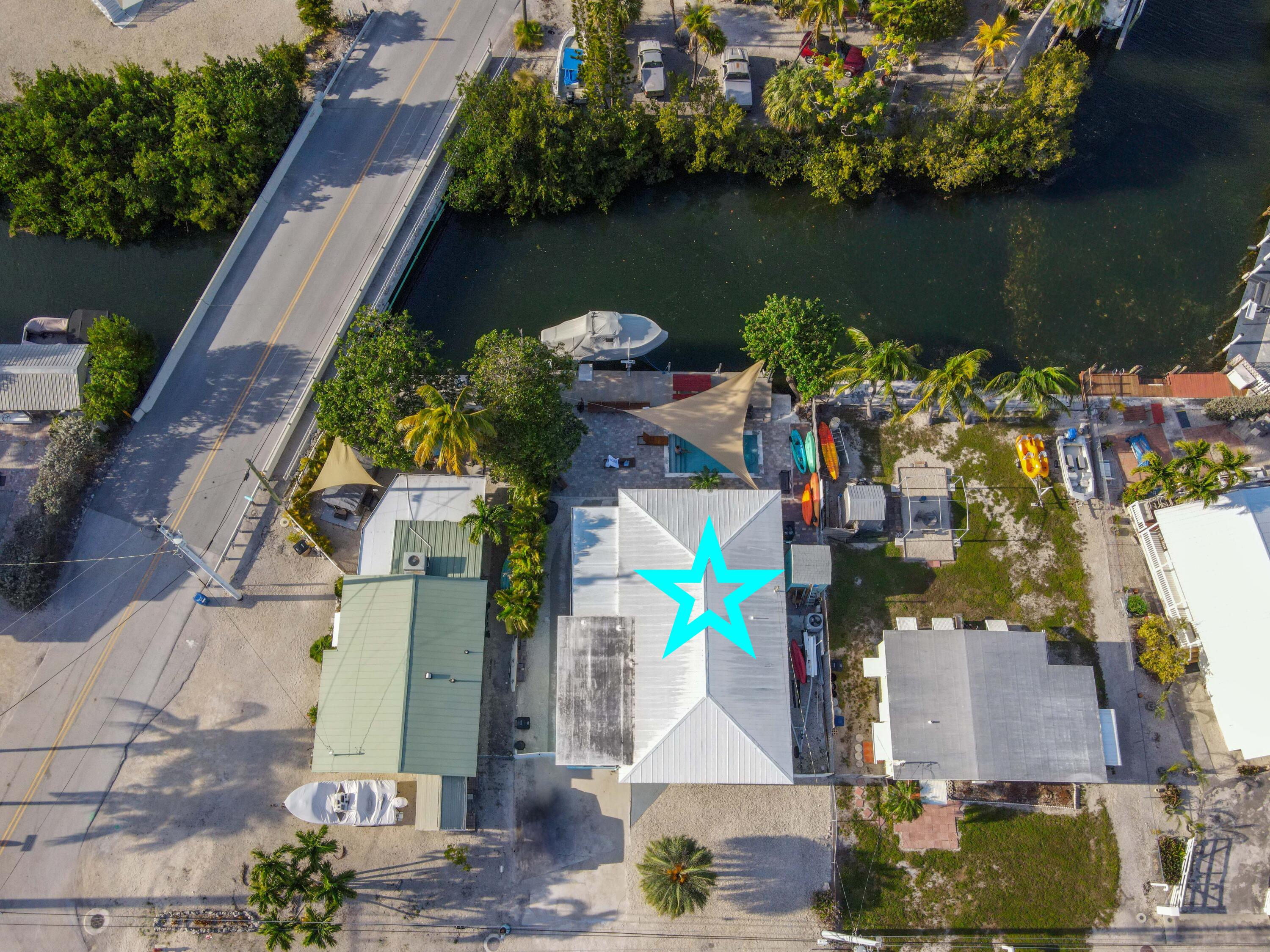 8260 Aviation Boulevard Marathon, FL 33050 - Photo 25 of 36 an aerial view of houses with outdoor space