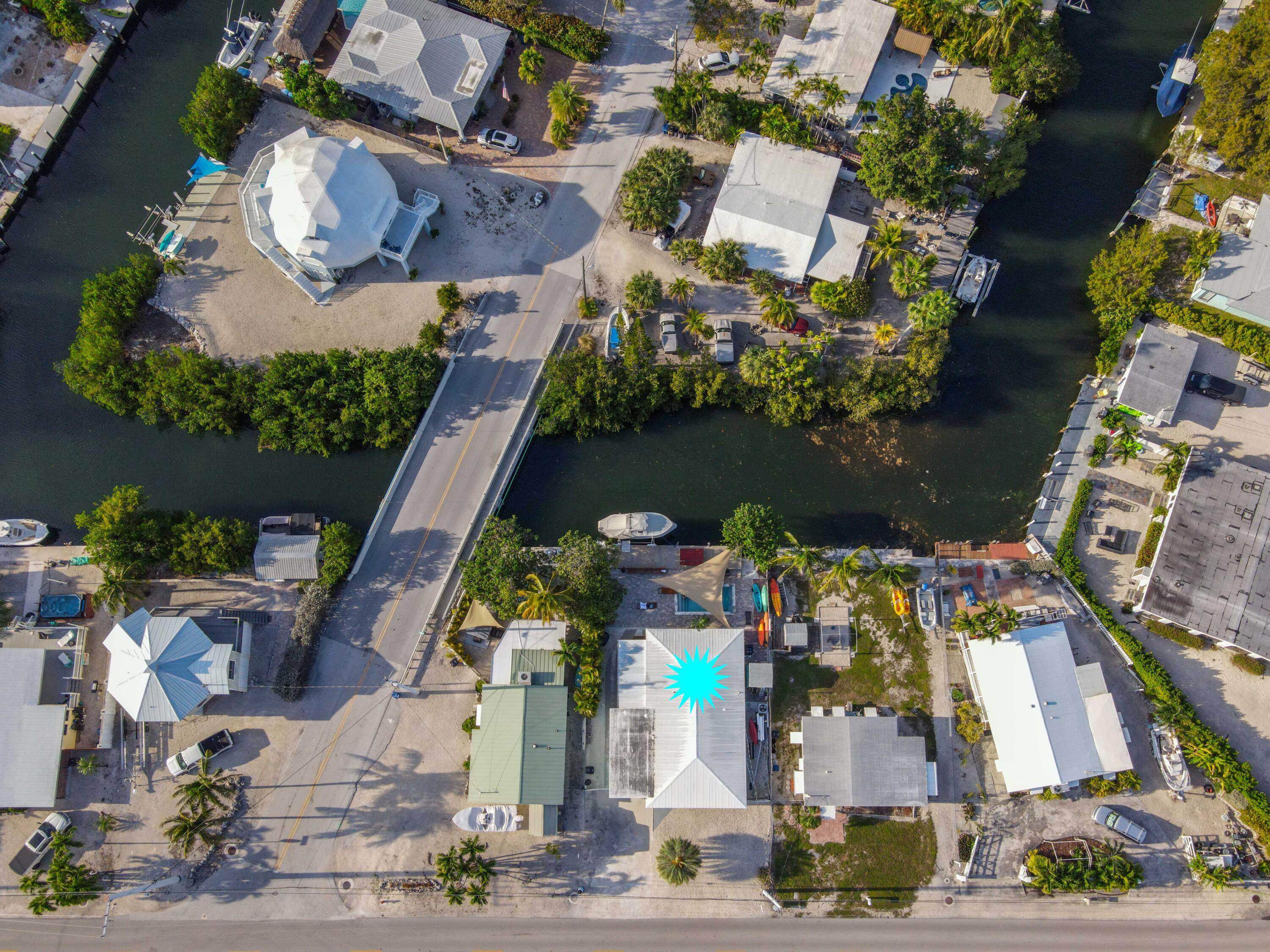 8260 Aviation Boulevard Marathon, FL 33050 - Photo 26 of 36 an aerial view of a house with outdoor space