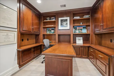 a kitchen that has a sink and a stove in it