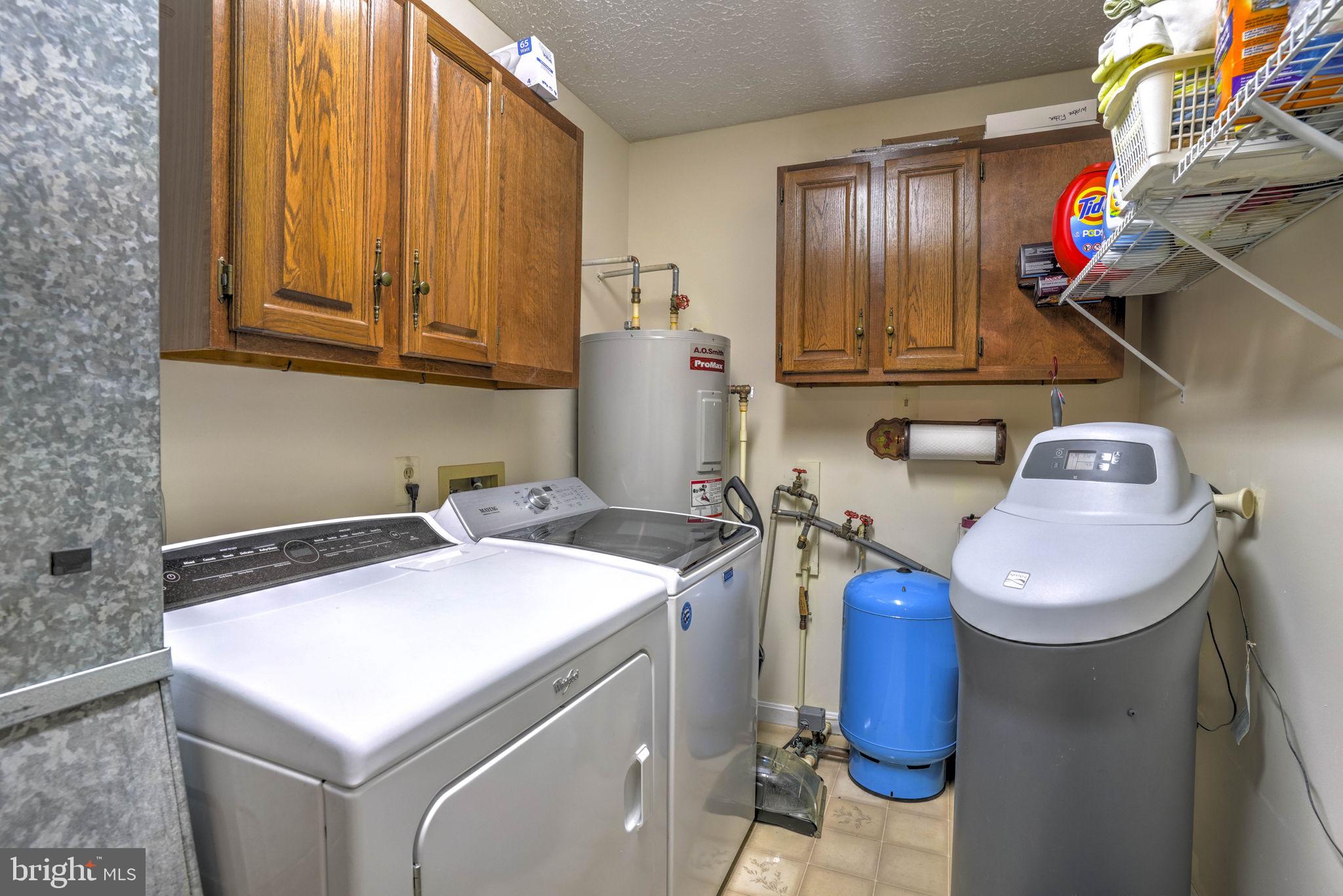 4949 Idlewilde Road Shady Side, MD 20764 - Photo 22 of 28 a utility room with dryer and washer