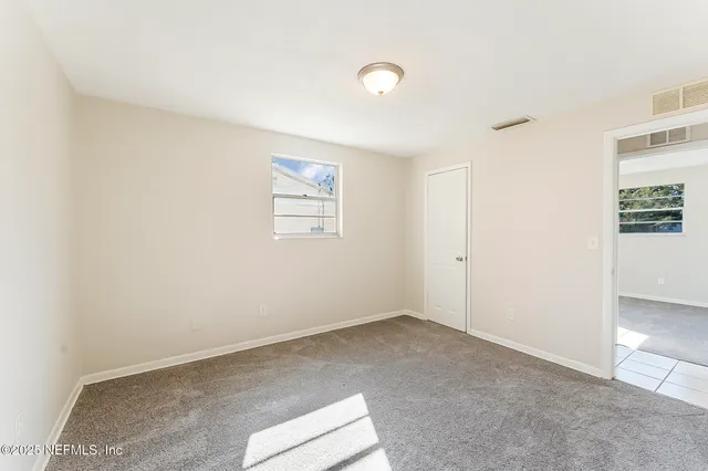 a view of a bathroom with shower