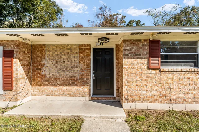 a view of a entryway door front of house