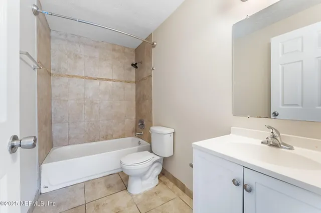 a house with trees in the background