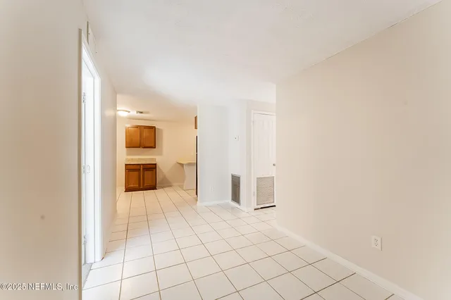 a view of a kitchen with a sink