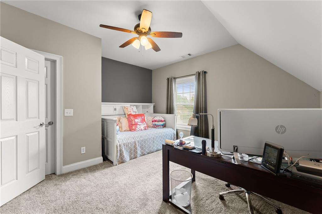6643 Windvane Point Clermont, GA 30527 - Photo 48 of 88 a view of a workspace with furniture