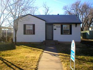 4626 Bowie Street Amarillo, TX 79110 - Photo 1 of 5 a front view of a house with a yard