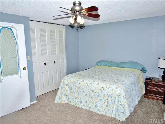 7705 Kingsberry Court Raleigh, NC 27615 - Photo 16 of 25 Master Bedroom