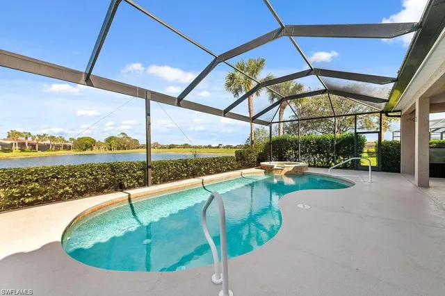 a view of a swimming pool with a porch