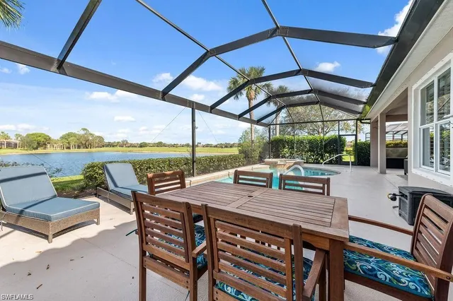 a view of a swimming pool with a porch