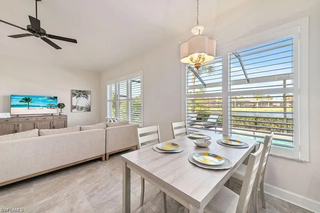 a kitchen with a sink stove and white cabinets