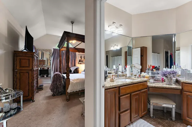 a room with wooden floor and furniture