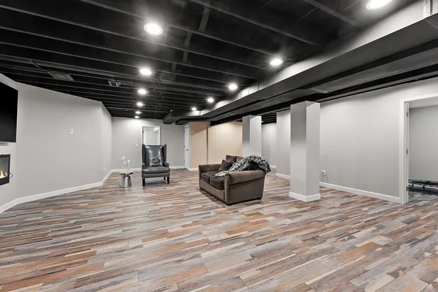 a house view with a sitting space and garden