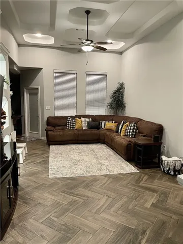 a kitchen with stainless steel appliances granite countertop a sink stove and microwave