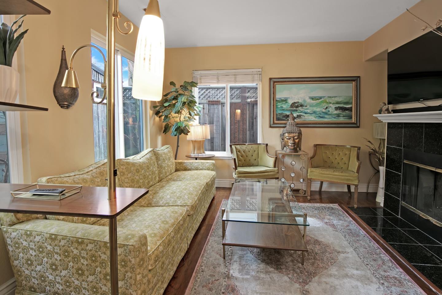 708 Coast Range Drive Scotts Valley, CA 95066 - Photo 15 of 37 a living room with fireplace furniture and a flat screen tv