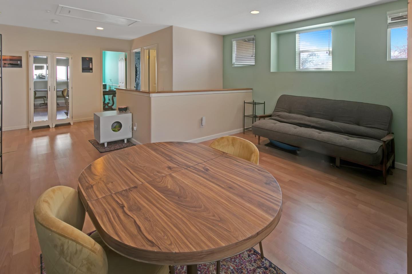 708 Coast Range Drive Scotts Valley, CA 95066 - Photo 19 of 37 a bedroom with a bed and wooden floor