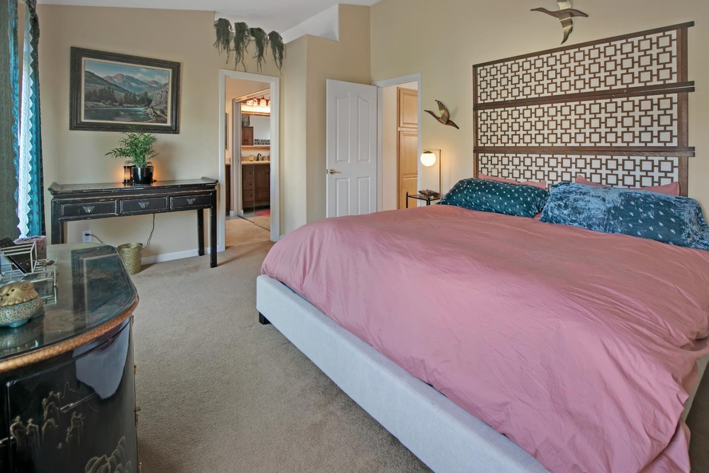 708 Coast Range Drive Scotts Valley, CA 95066 - Photo 20 of 37 a bedroom with a bed and a table