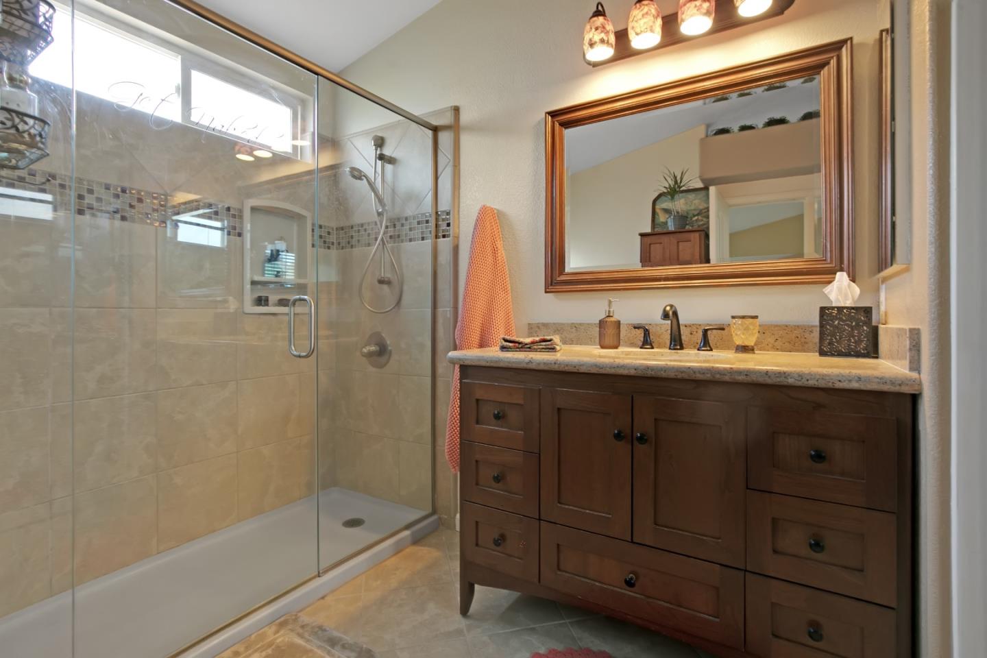708 Coast Range Drive Scotts Valley, CA 95066 - Photo 22 of 37 a bathroom with a double vanity sink mirror double shower and a mirror
