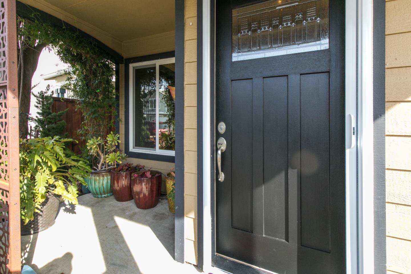 708 Coast Range Drive Scotts Valley, CA 95066 - Photo 3 of 37 a couple of potted plants in front of door