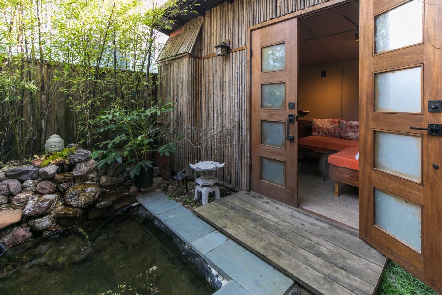 708 Coast Range Drive Scotts Valley, CA 95066 - Photo 34 of 37 a backyard of a house with outdoor seating