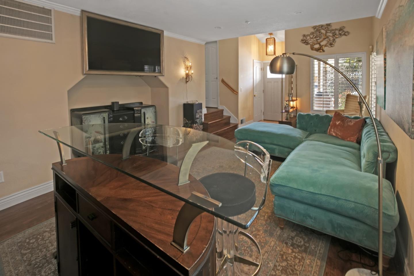 708 Coast Range Drive Scotts Valley, CA 95066 - Photo 6 of 37 a living room with furniture and a flat screen tv