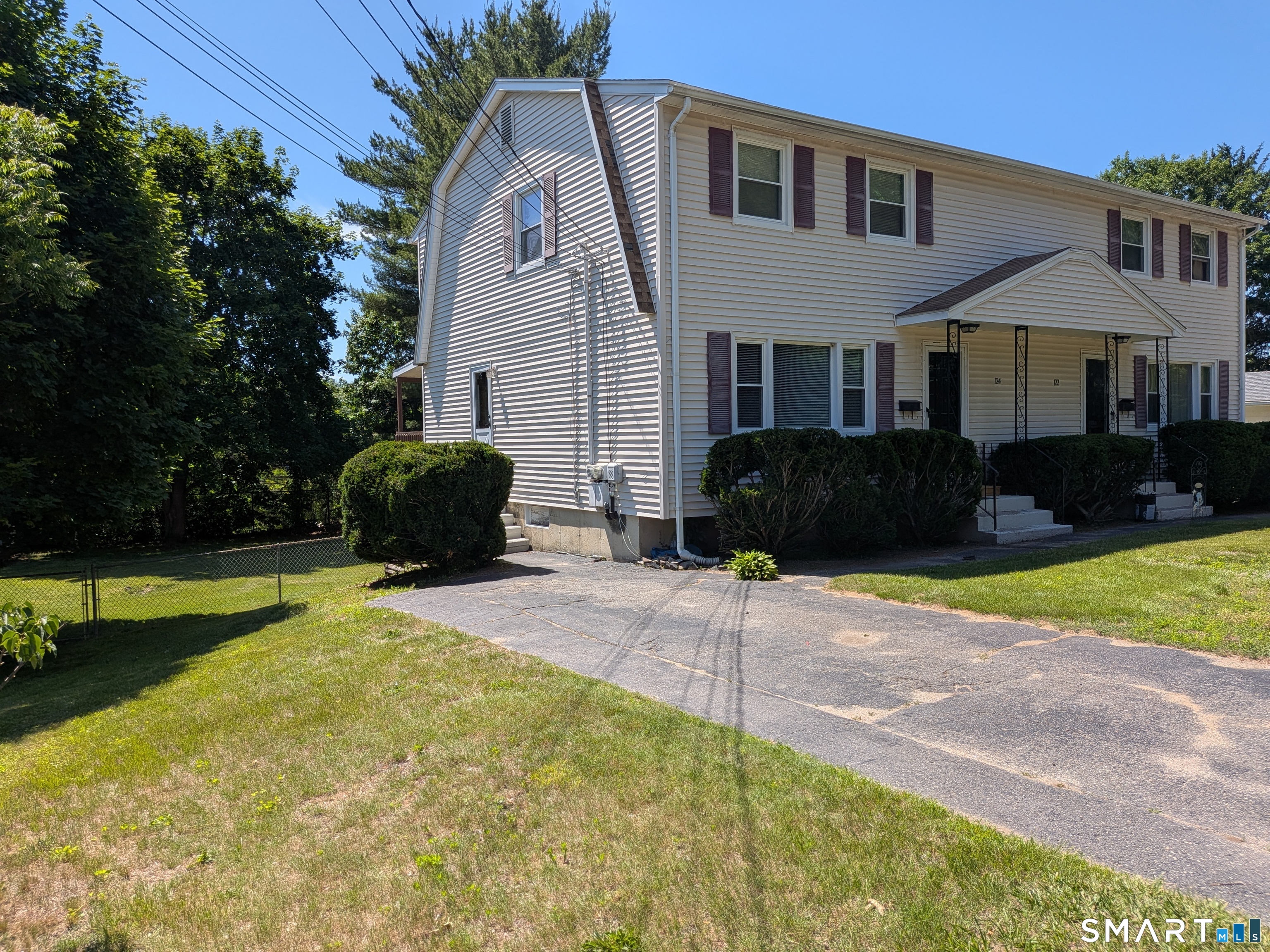 124 Spring Lake Road Waterbury, CT 06706 - Photo 1 of 34 Front and side view of this large half-duplex