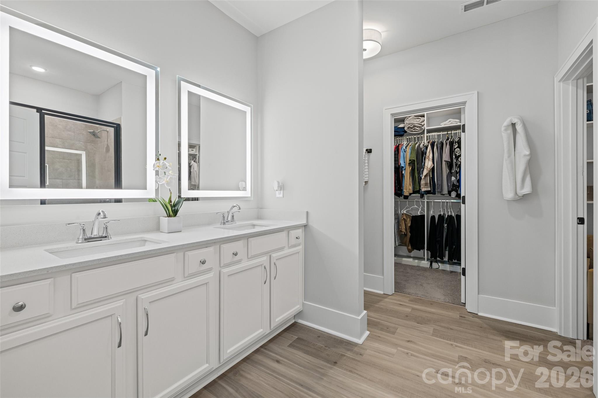 319 Inland Cove Court Clover, SC 29710 - Photo 22 of 47 a spacious bathroom with a double vanity sink and mirror