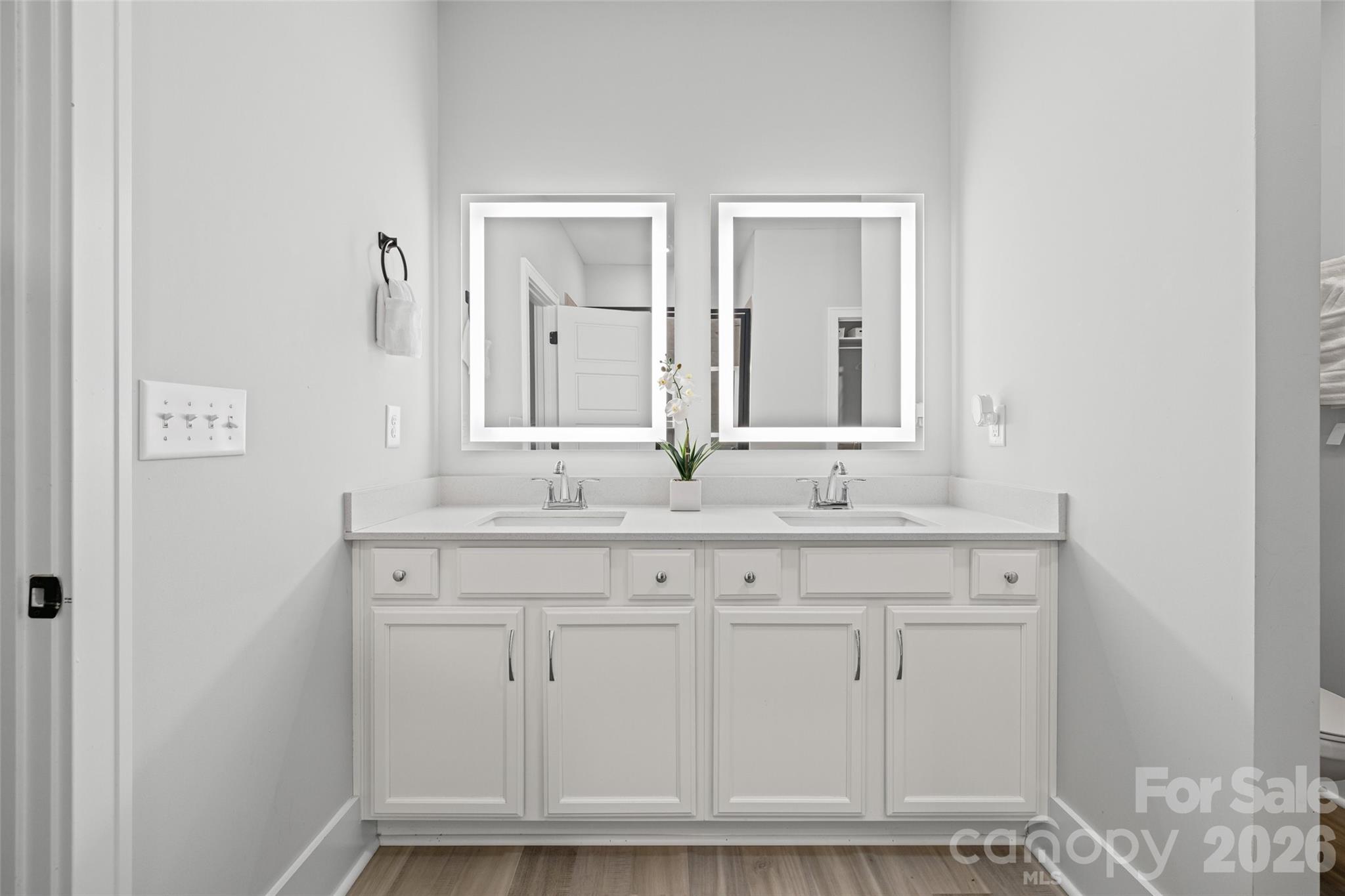 319 Inland Cove Court Clover, SC 29710 - Photo 24 of 47 a bathroom with granite countertop white vanity and a mirror