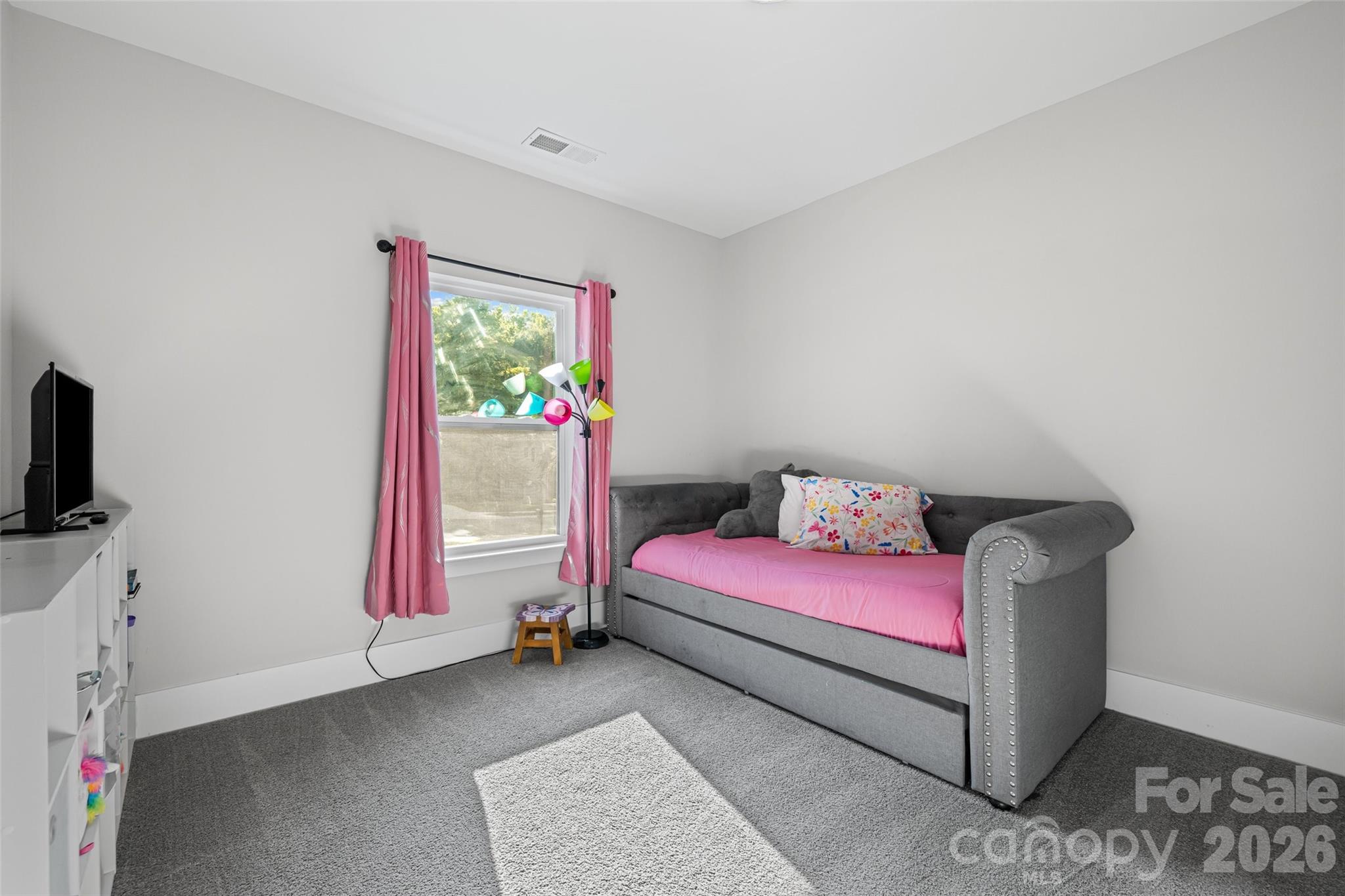 319 Inland Cove Court Clover, SC 29710 - Photo 27 of 47 a bedroom with a bed and a window