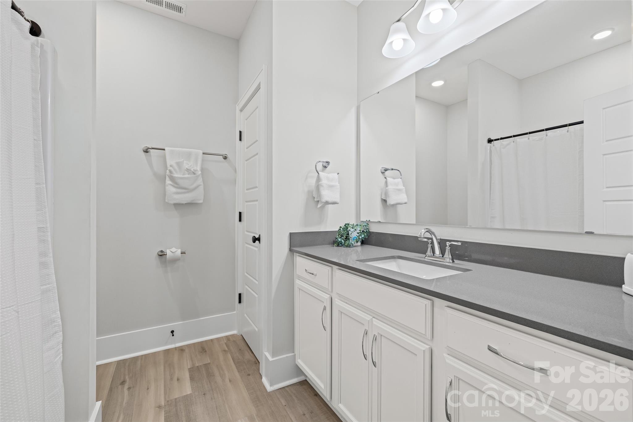 319 Inland Cove Court Clover, SC 29710 - Photo 31 of 47 a spacious bathroom with a granite countertop sink mirror and double