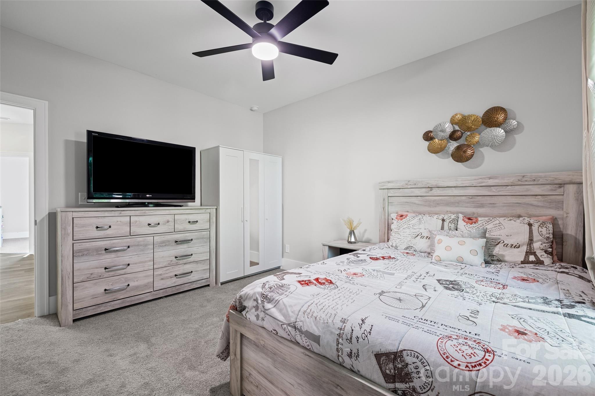 319 Inland Cove Court Clover, SC 29710 - Photo 32 of 47 a bedroom with a bed and a flat screen tv