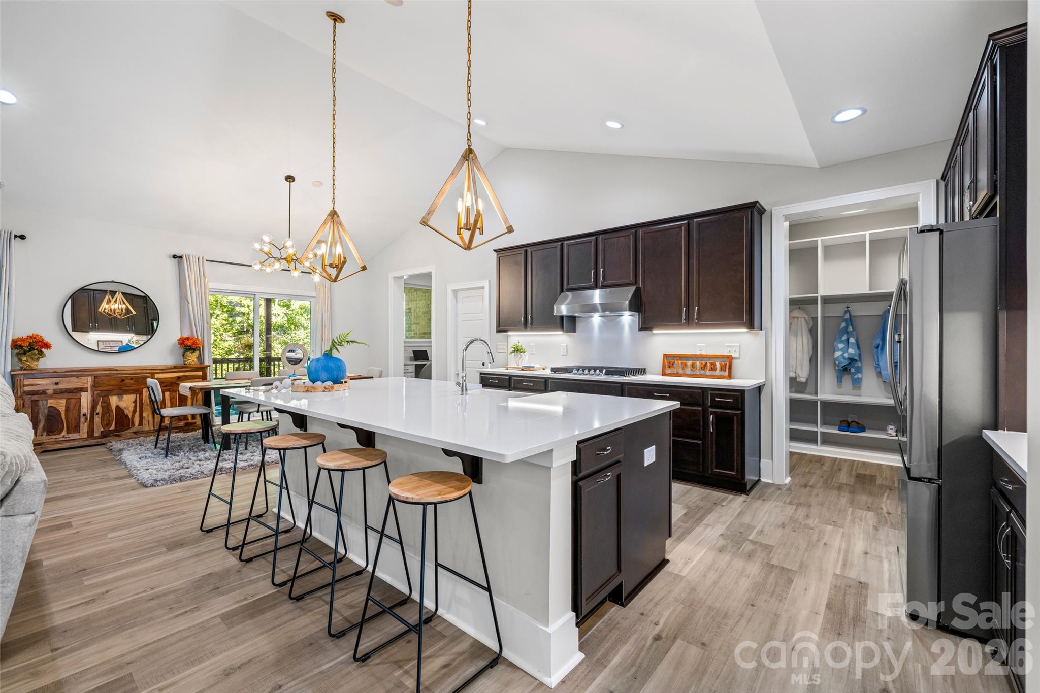 319 Inland Cove Court Clover, SC 29710 - Photo 6 of 47 a kitchen with granite countertop a stove a sink a oven and a refrigerator