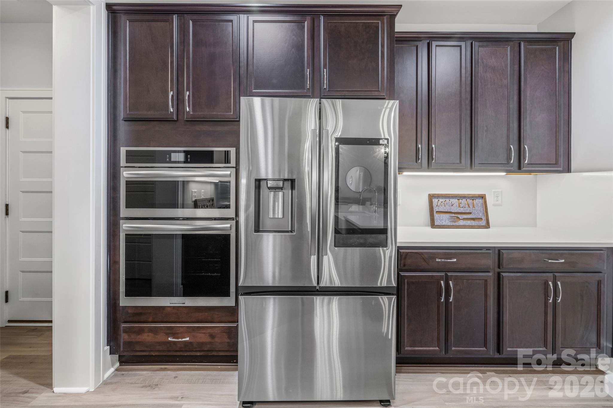 319 Inland Cove Court Clover, SC 29710 - Photo 10 of 47 a metallic refrigerator freezer sitting in a kitchen
