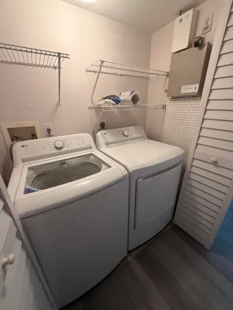 a utility room with dryer and washer