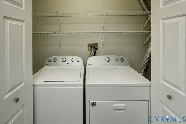 a utility room with dryer and washer