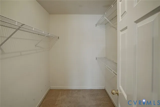 a view of a room with racks on the wall