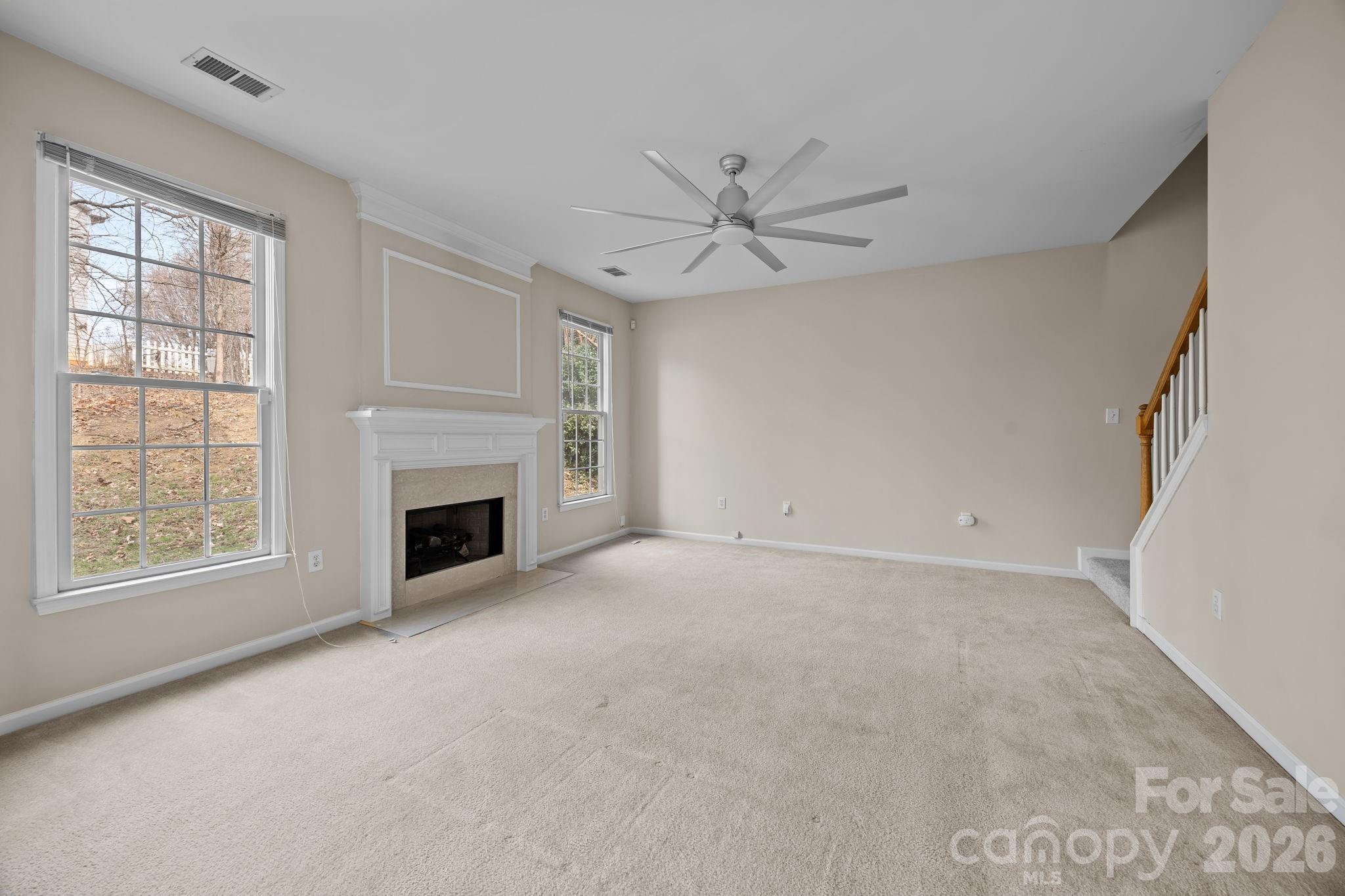 3203 Arklow Road Charlotte, NC 28269 - Photo 13 of 44 a view of empty room with a fireplace