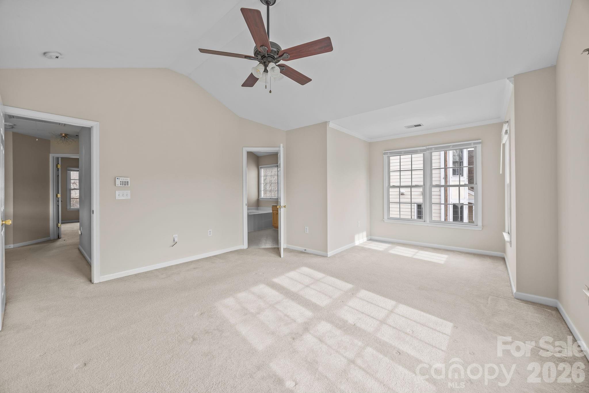 3203 Arklow Road Charlotte, NC 28269 - Photo 18 of 44 a view of an empty room with a window