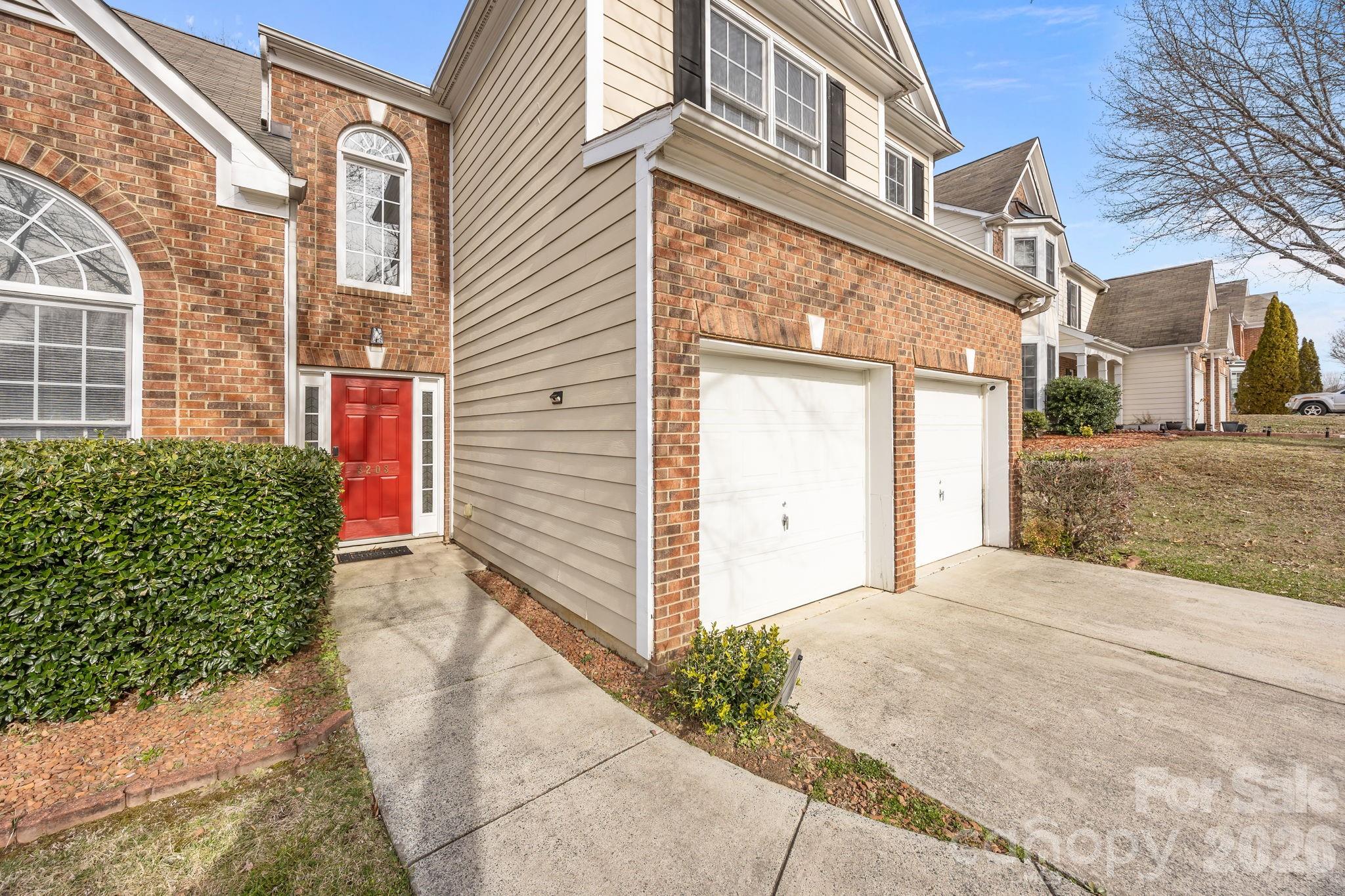 3203 Arklow Road Charlotte, NC 28269 - Photo 2 of 44 a view of a building with a street