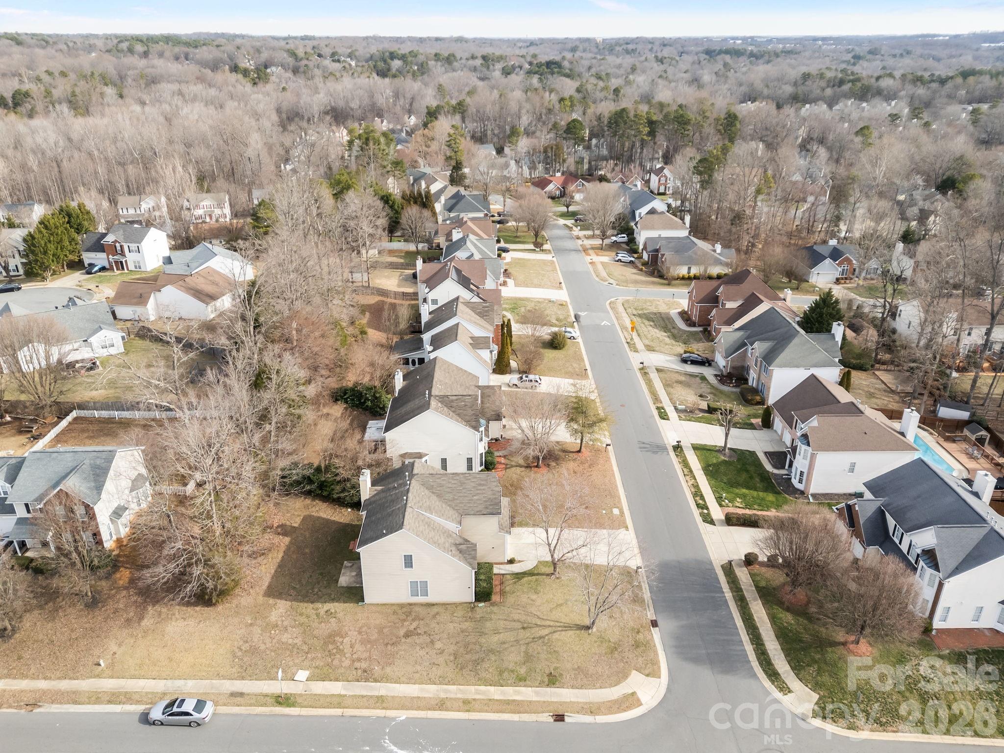3203 Arklow Road Charlotte, NC 28269 - Photo 35 of 44 an aerial view of a house with a yard
