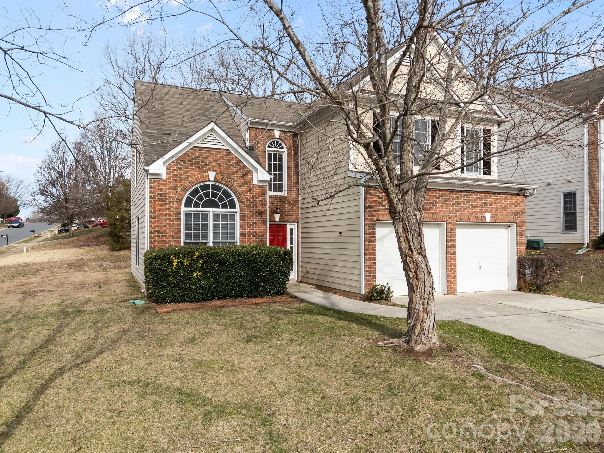 3203 Arklow Road Charlotte, NC 28269 - Photo 41 of 44 a front view of a house with a yard