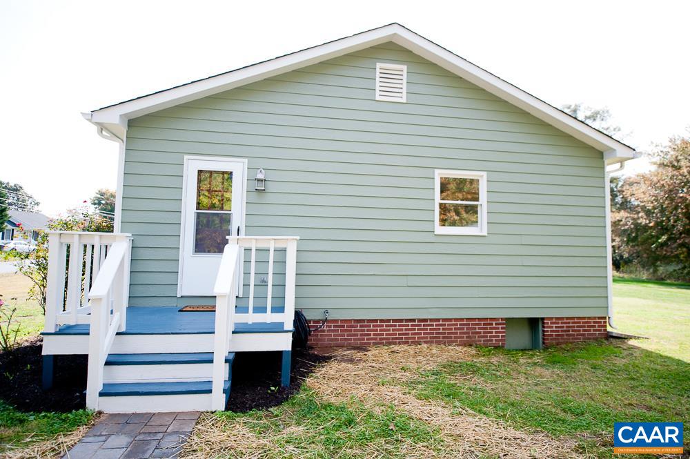 189 Stephens Loop Ruckersville, VA 22968 - Photo 5 of 20 a front view of a house with a garden