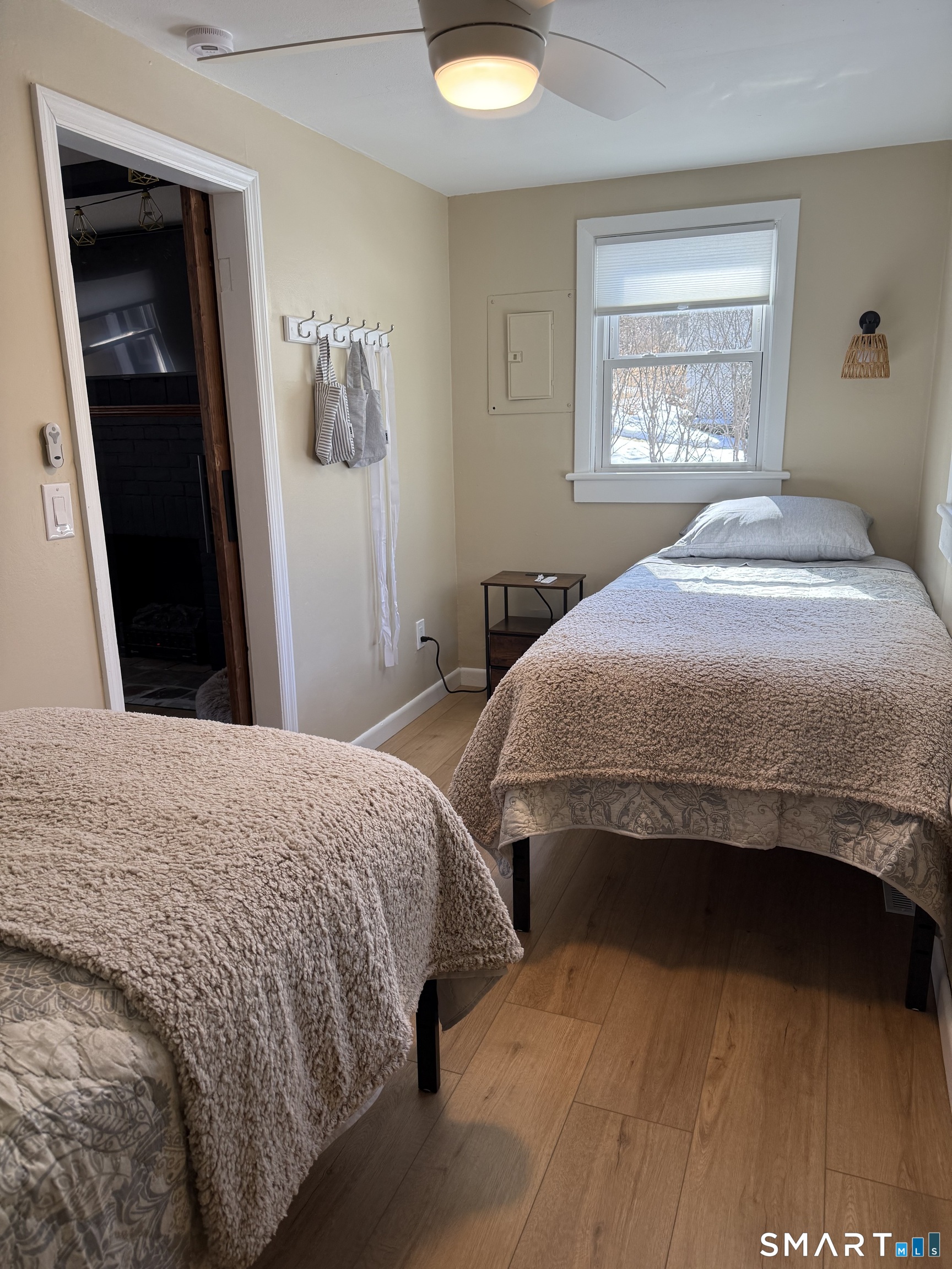 27 Dilliston Road New Hartford, CT 06057 - Photo 22 of 43 a bedroom with a bed and a lamp on dresser
