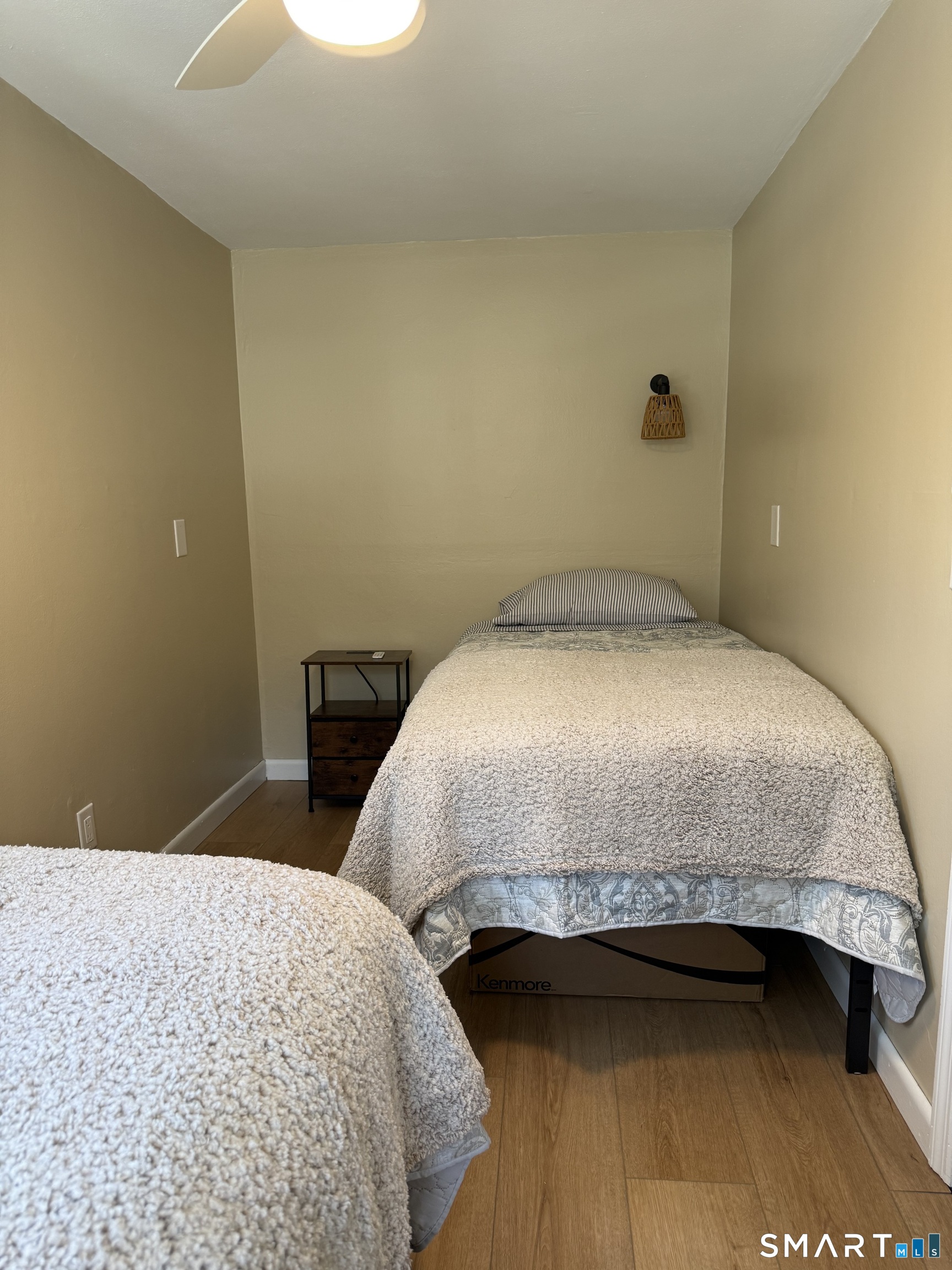 27 Dilliston Road New Hartford, CT 06057 - Photo 23 of 43 a bedroom with a bed and wooden floor
