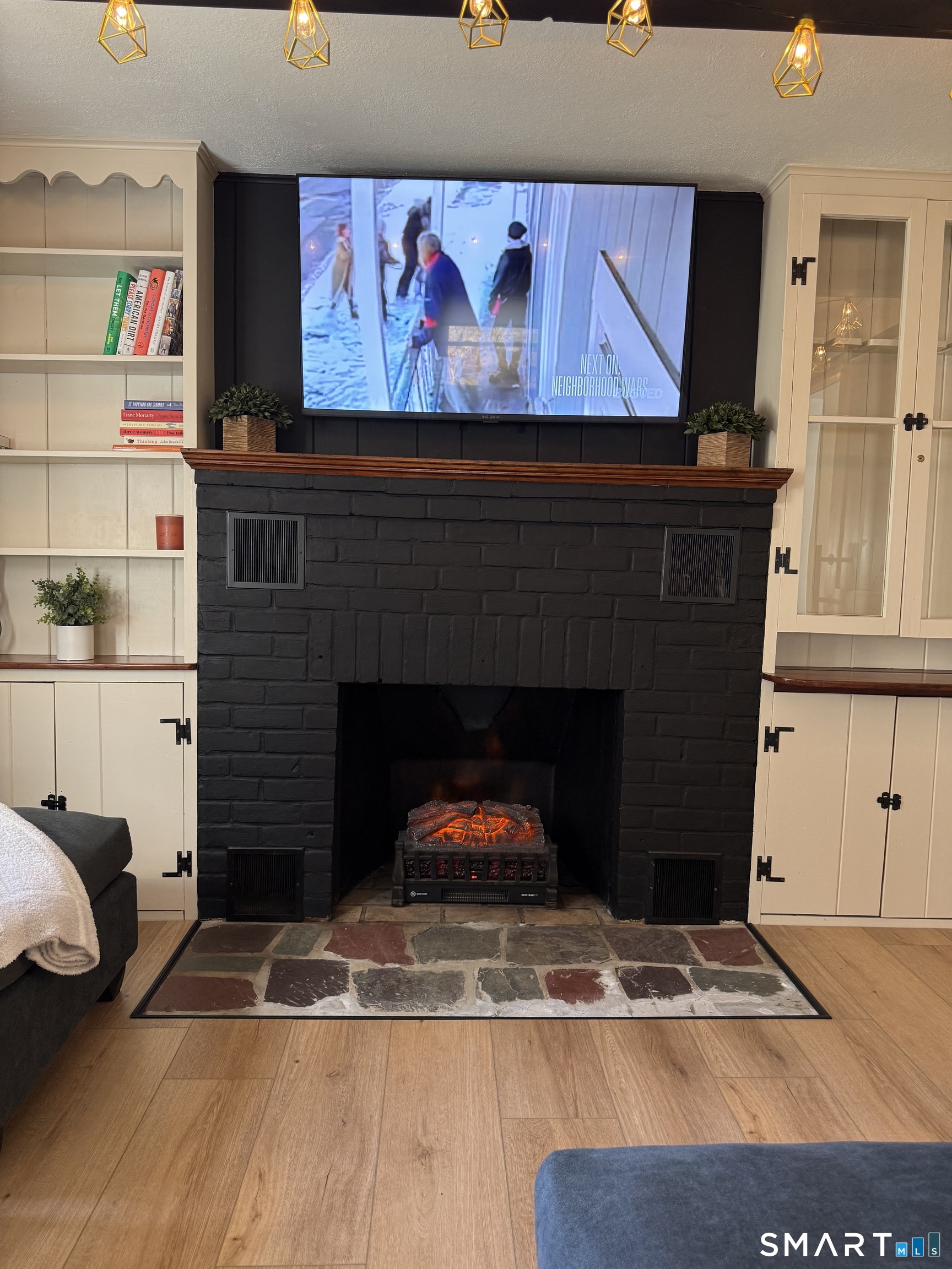 27 Dilliston Road New Hartford, CT 06057 - Photo 29 of 43 a living room with furniture and a fireplace