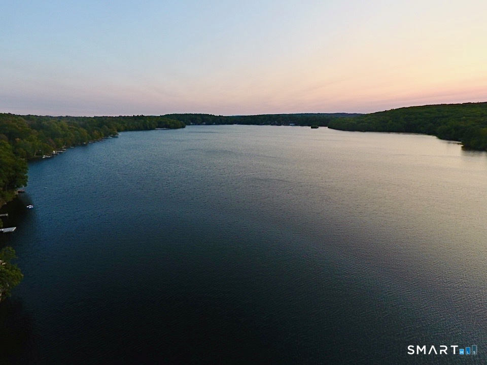 27 Dilliston Road New Hartford, CT 06057 - Photo 36 of 43 a view of lake with sunset in background