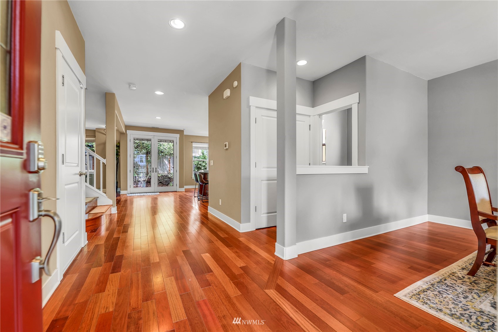 871 Jericho Place Northeast Renton, WA 98059 - Photo 3 of 31 a view of a room with wooden floor and furniture
