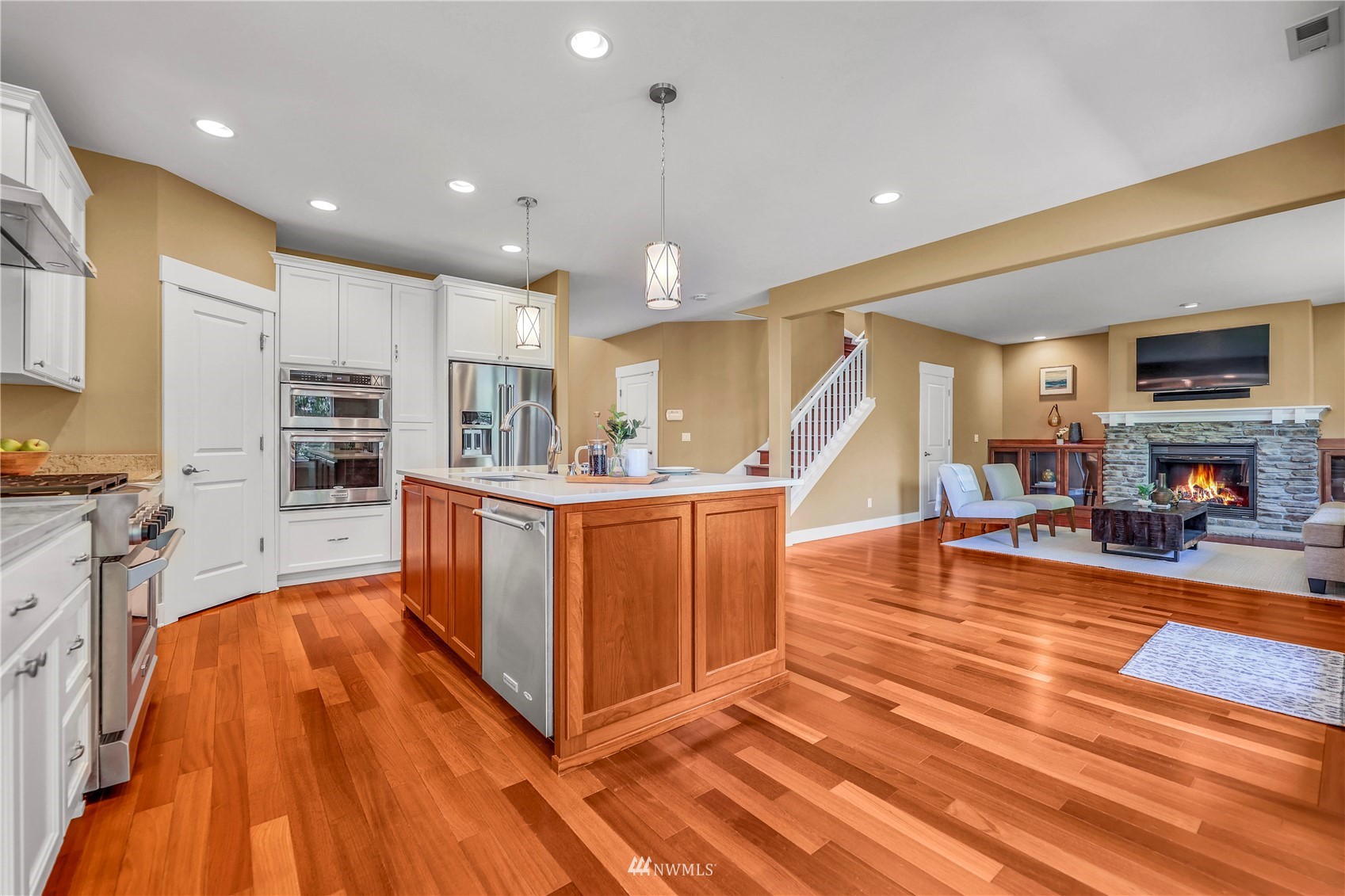 871 Jericho Place Northeast Renton, WA 98059 - Photo 8 of 31 a view of kitchen with furniture and wooden floor