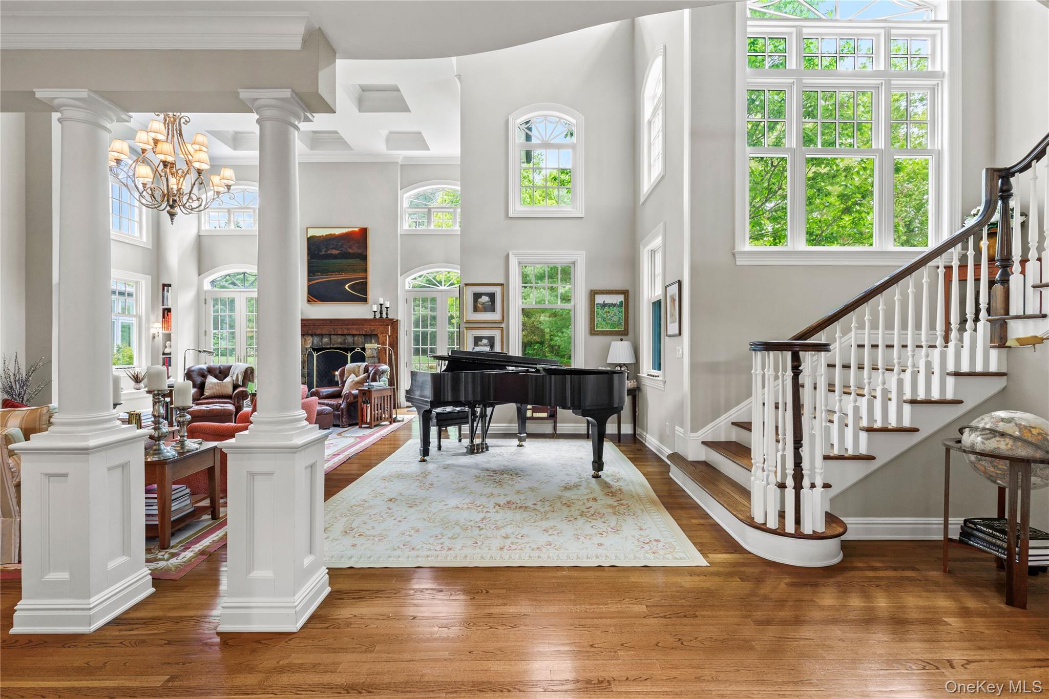 63 Old Mill River Road Pound Ridge, NY 10576 - Photo 7 of 47 a living room with furniture and a floor to ceiling window