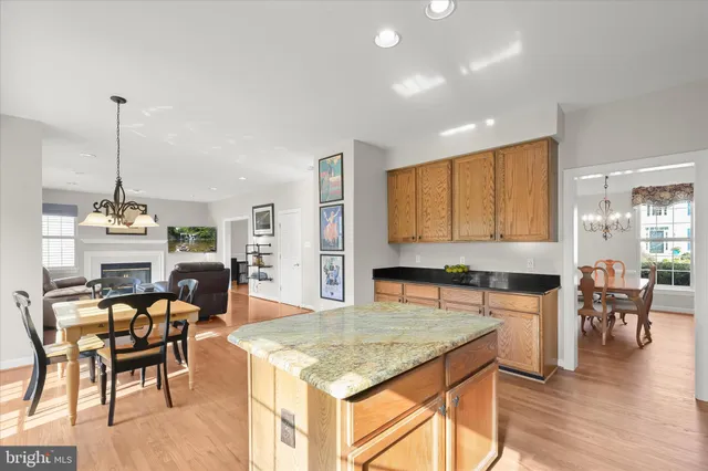 a living room with furniture or couch and a wooden floor