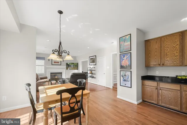 a bathroom with a toilet and a mirror
